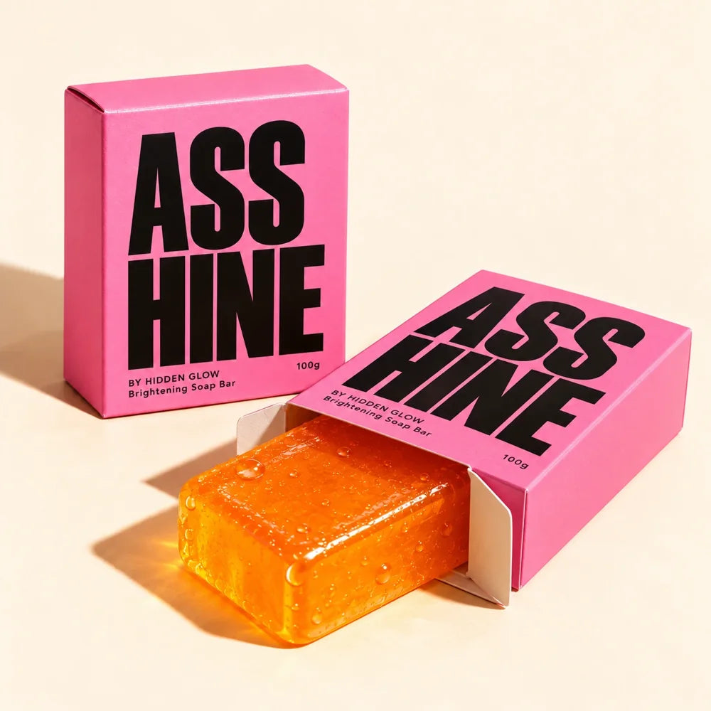The duo: two Asshine boxes, one open with the orange bar sliding out
